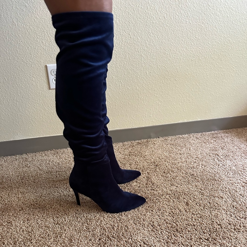 Knee high blue boots